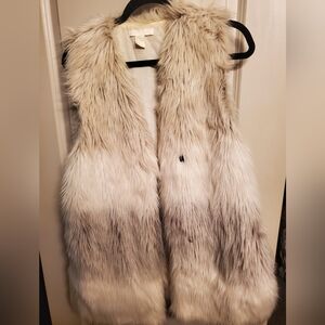 Longer length womens faux fur vest